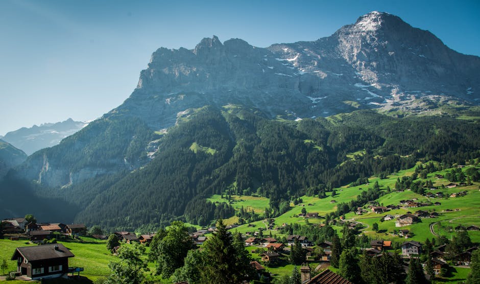 Swiss Alps Travel Guide mountain landscape, alpine scenery, snowy peaks, lakes, villages